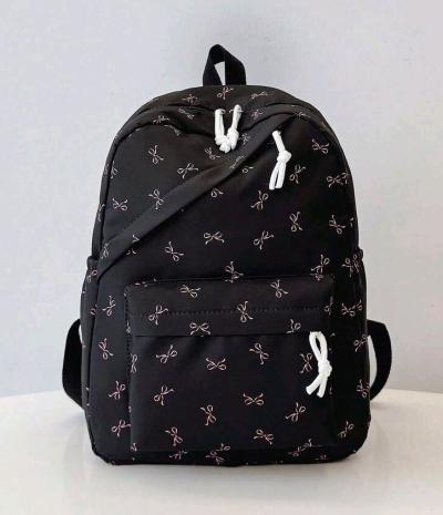 couderoy pink bow backpack