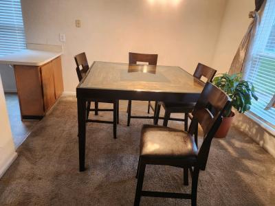 dinning table with glass top and four matching chairs - Thumbnail 5