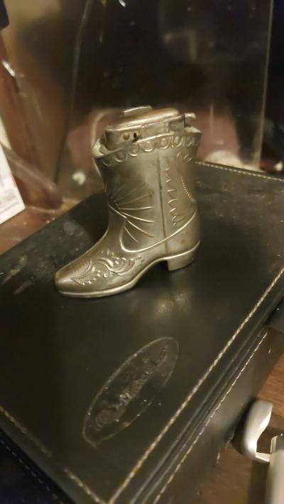 vintage cowboy boot table top lighter with imbossed pattern