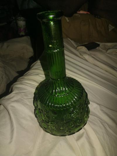green glassware vase very beautiful with designs