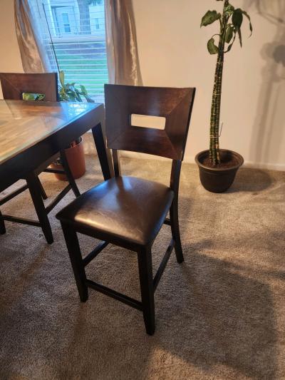 dinning table with glass top and four matching chairs - Thumbnail 3