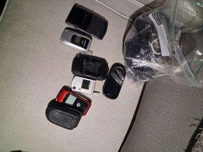 4 old phones and cases