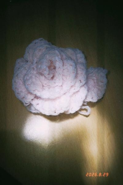 Cute homemade pink crocheted rose