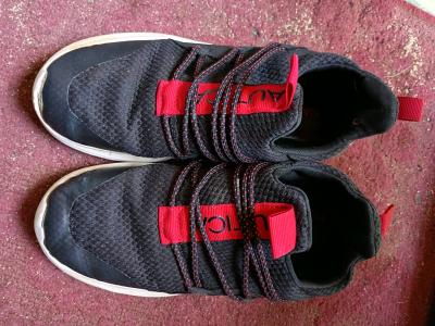 A Nice Pair of Red and Black Nautica Sneakers