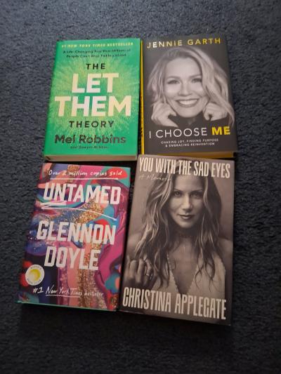 Four Hardcover books and four soft