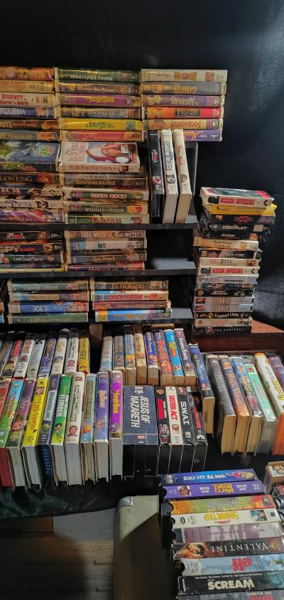 lot of DVDs and VHS types Android shape - Thumbnail 2