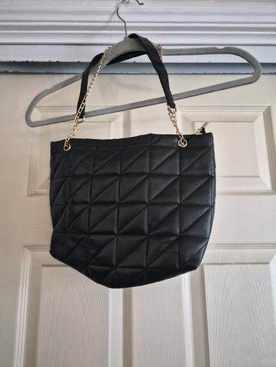 Black shoulder or crossbody meduim hang bag