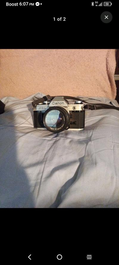 Vintage Canon AE1 35mm SLR Film Camera with FD 50mm f18 Lens