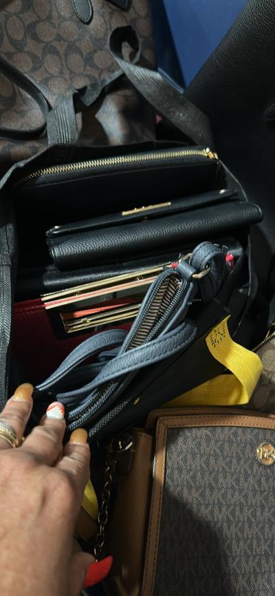 woman bags and wallets multiple type and brands