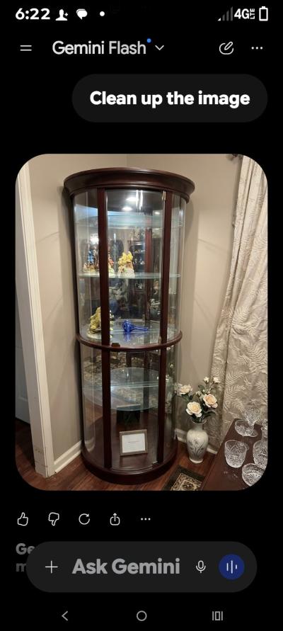 vintage curio cabinetwith a built in light display
