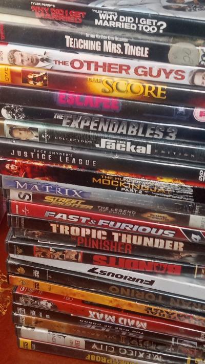 over 100 dvd movies all in case like new