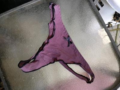 A Sexy Womans Nice New Pair of purple and black  thong panti