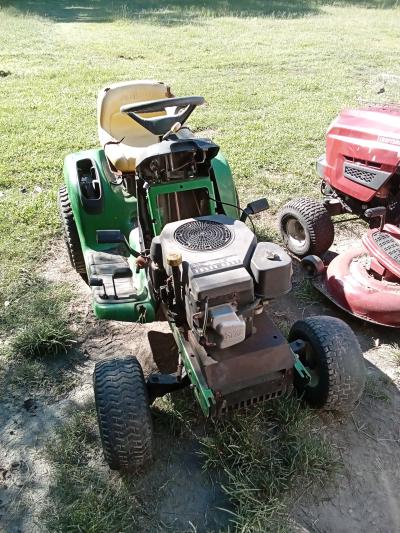 John Deere LT 150 riding mower engine hole mower comes with