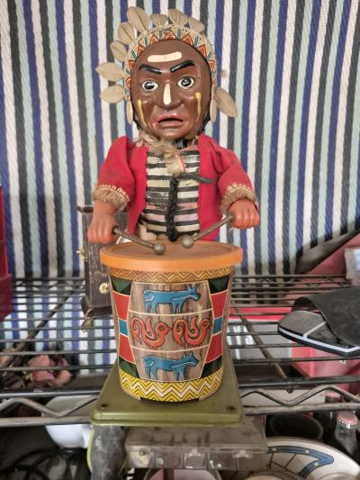 vintage 1950s alps battery operated drumming indian joe tin