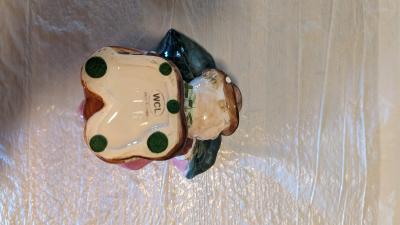 vintage scarecrow holding a fall leaf on his back - Thumbnail 8