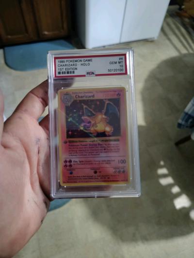 selling first edition 1999 Charizard PSA graded gem mint 10