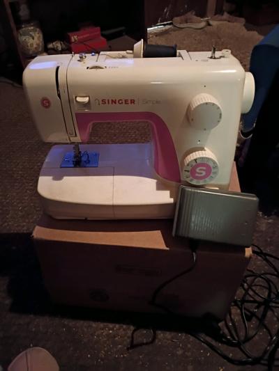 A Nice Pink  and White Singer Sowing Machine