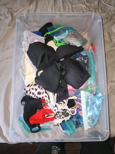bins of small and medium swim suits