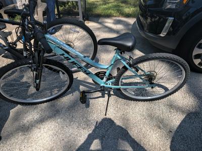 teal Huffy Rock Creek mountain bike