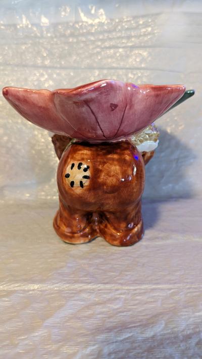 vintage scarecrow holding a fall leaf on his back - Thumbnail 4