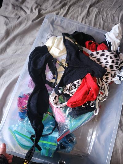 bins of small and medium swim suits - Thumbnail 3